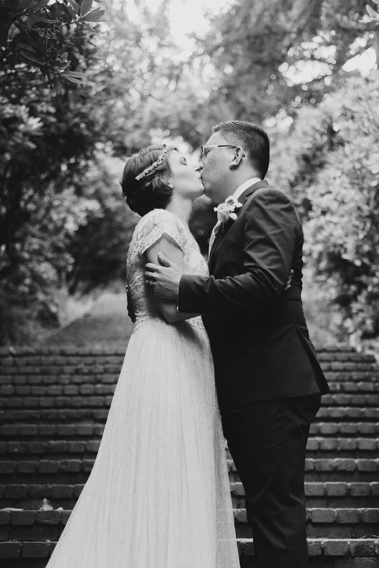 Bride and Groom's first kiss in Laurelhurst Park | Downtown Portland Elopement