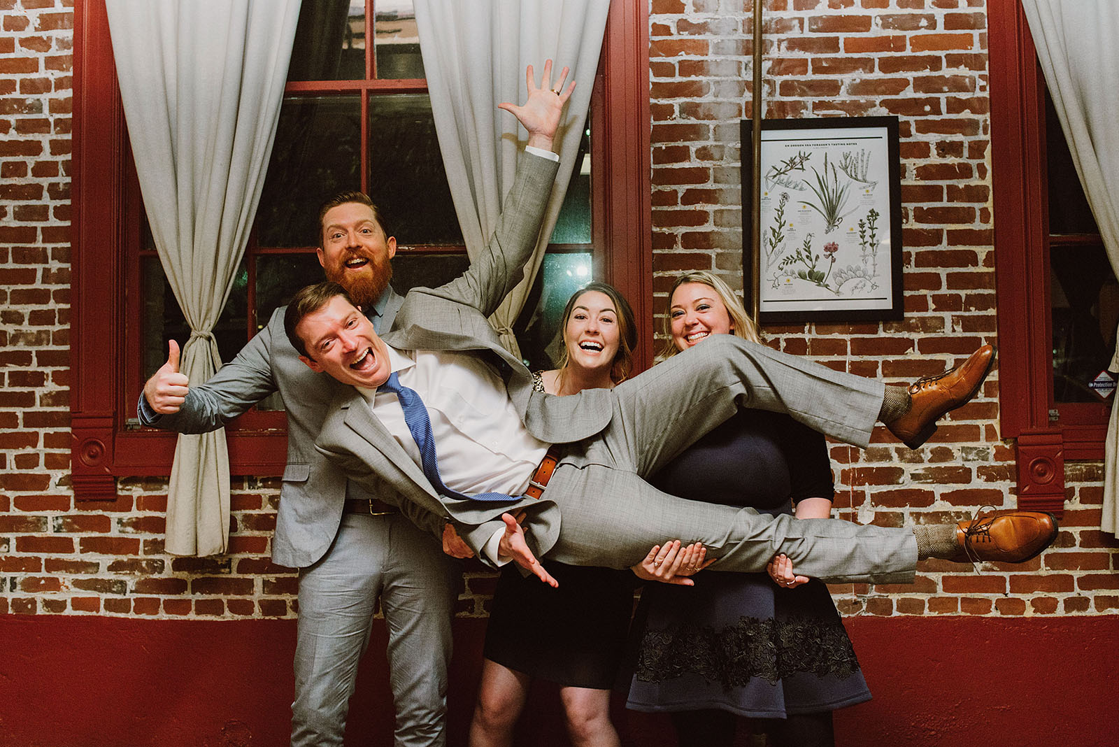 Silly portrait of the Groom and his siblings at an Intimate Restaurant Wedding in Portland, OR