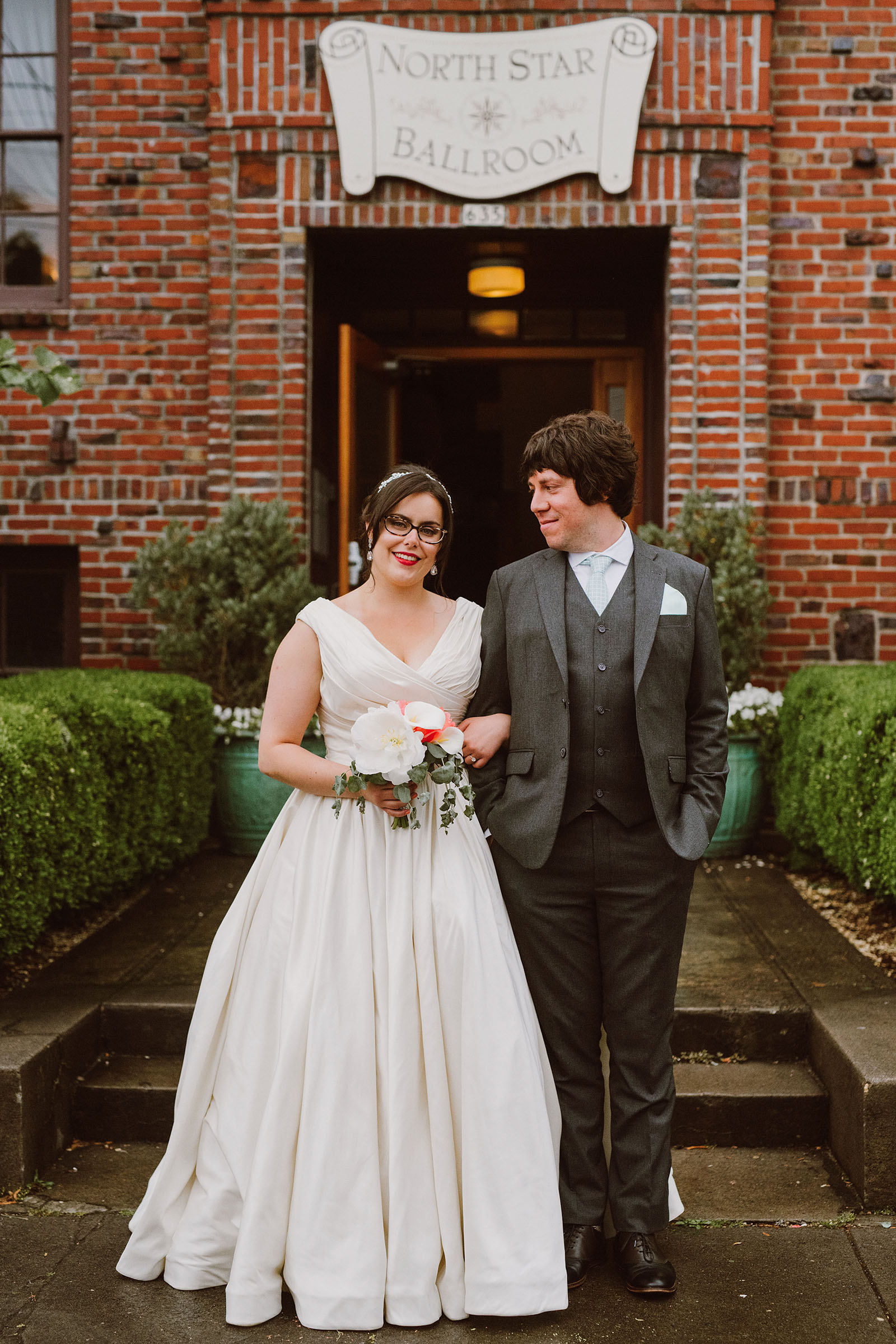 Portrait of Bride and Groom on front steps - Polaris Hall Wedding