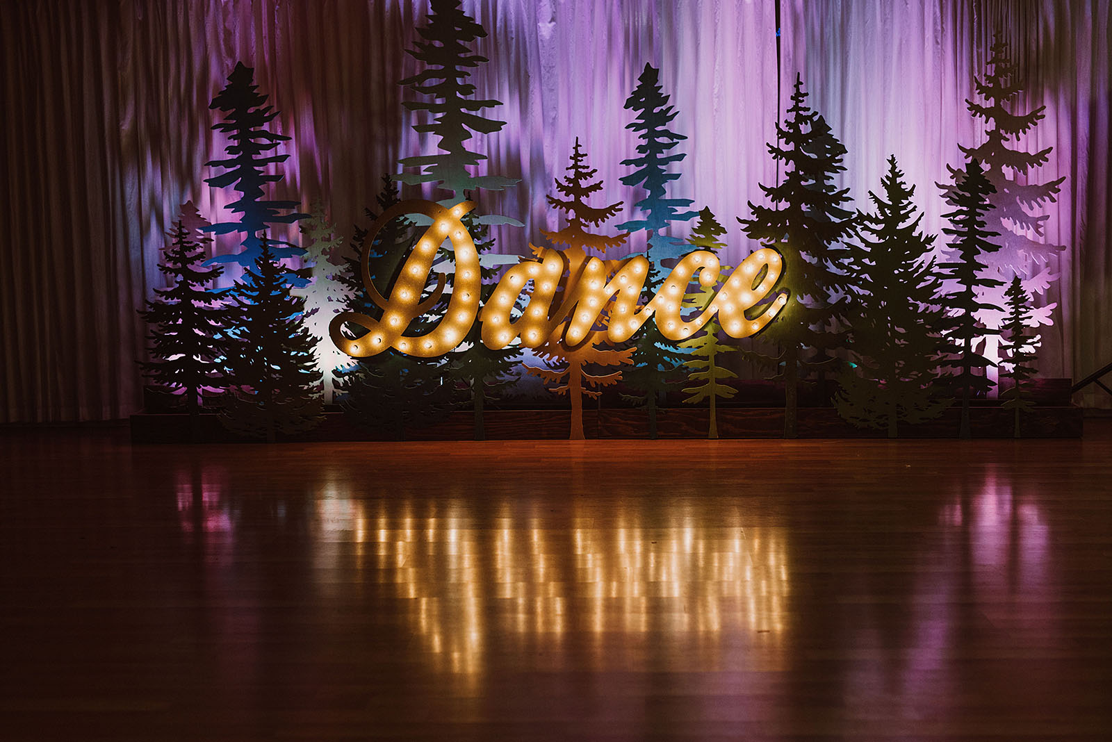 Light up sign on the dance floor at The Colony St Johns Wedding