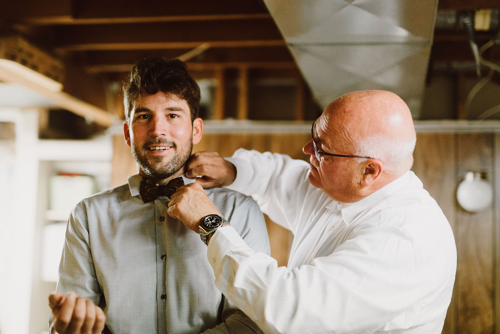 groom's father adjusting his son's tie - portland wedding photography