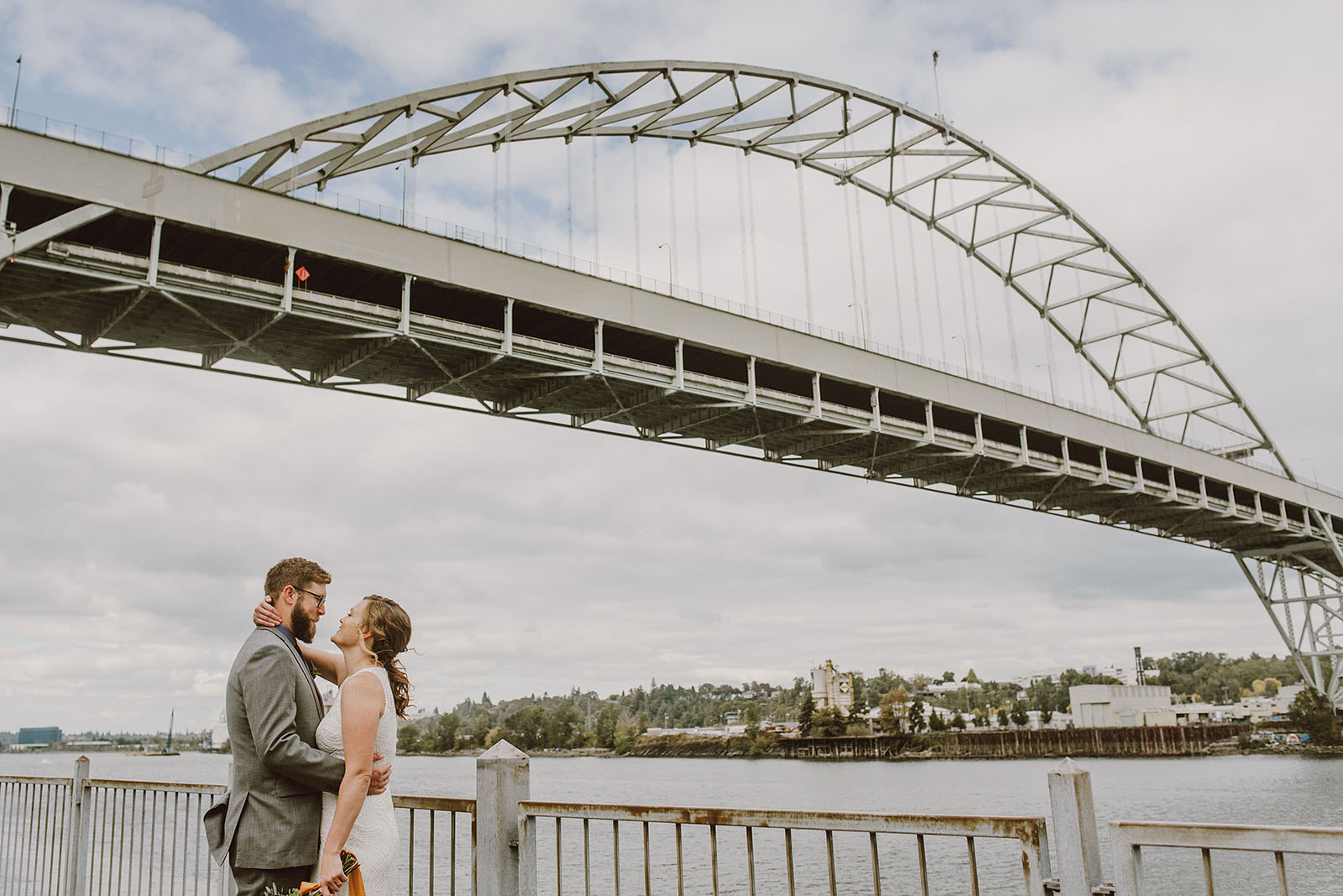 bride and groom's first look under the Fremont Bridge - portland wedding photography